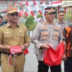 Pemkab Aceh Selatan Laksanakan Gerakan Pembagian Bendera Merah Putih Secara Nasional