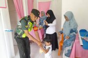 Babinsa Koramil 05/Samadua Kodim 0107/Aceh Selatan Dampingi Kegiatan Posyandu di Desa Binaan