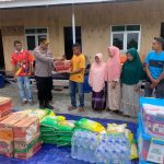 Kapolres Pidie Salurkan Bantuan Sembako pada Kegiatan Serah Terima Kunci Huntara dan Penyerahan DTH di Desa Blang Pandak