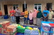 Kapolres Pidie Salurkan Bantuan Sembako pada Kegiatan Serah Terima Kunci Huntara dan Penyerahan DTH di Desa Blang Pandak